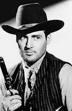 Marshall Reed como Sheriff Henry Plummer