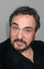 John Rhys-Davies as 