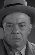 Russell Collins como Mr. Hastings