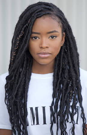 Lovie Simone as 