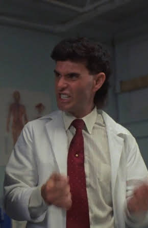 Barry Brenner as Coroner