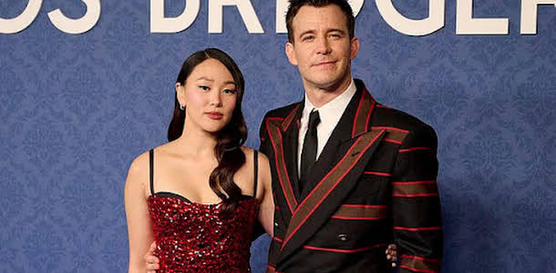 Bridgerton Stars Luke Thompson and Yerin Ha Stunning in Red at Madrid Masquerade Ball