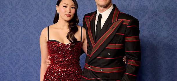 Bridgerton Stars Luke Thompson and Yerin Ha Stunning in Red at Madrid Masquerade Ball