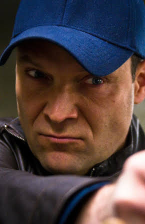 Eric Breker as 