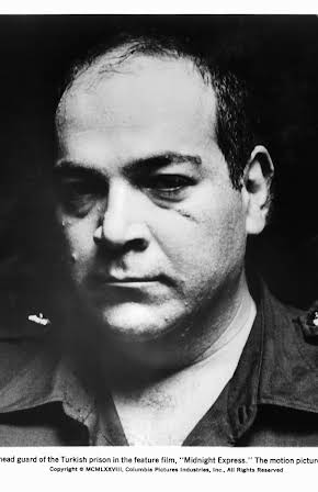 Paul L. Smith as 