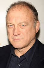 John Doman as 