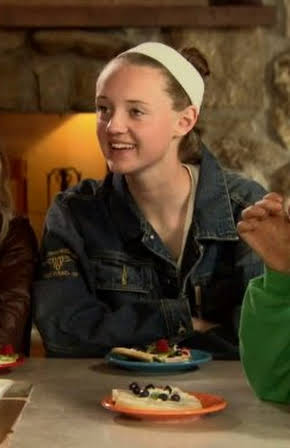 Paige Drummond as 