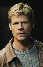 Joel Gretsch como 