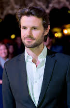 James Napier Robertson as Director