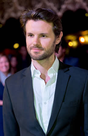 James Napier Robertson as Director