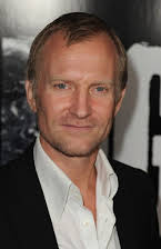 Ulrich Thomsen as 
