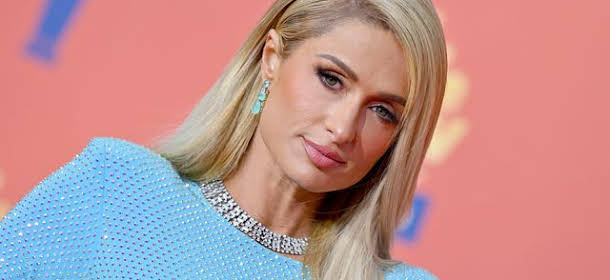 Paris Hilton announces birth of first child through surrogacy.