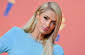 Paris Hilton announces birth of first child through surrogacy.