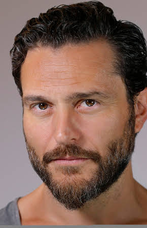 Giorgos Karamihos as 