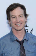 Rob Huebel as 