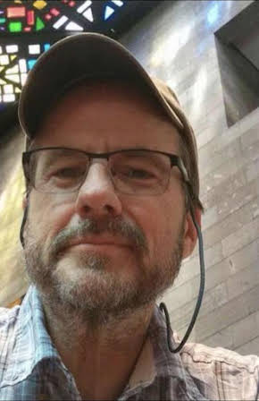 Scott Herriott as Director