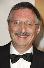Jeffrey Caine som Director