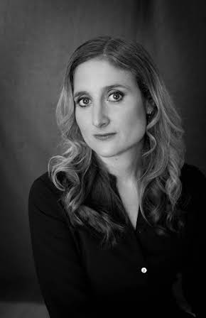 Megan Riakos as Director