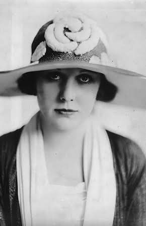 Edna Purviance as 