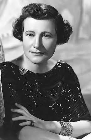 Odette Myrtil as Madame De Marchand