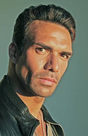 Darren Shahlavi as 