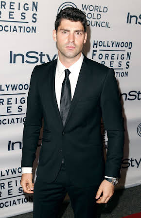 Travis Milne as 