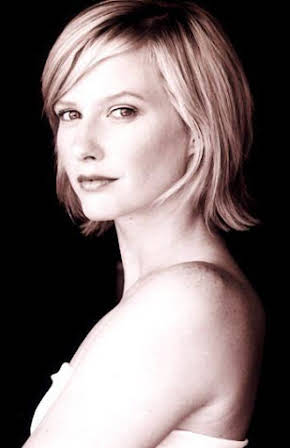 Emily Holmes as 
