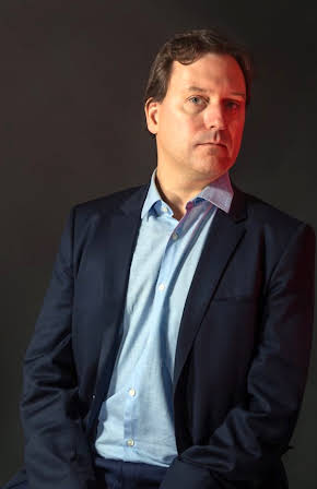 John Carreyrou as 