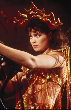 Melody Anderson as 