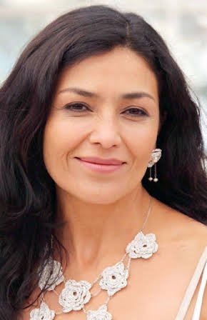 Dolores Heredia as 
