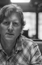 Erik Howsam som Director