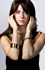 Mia Kirshner as 