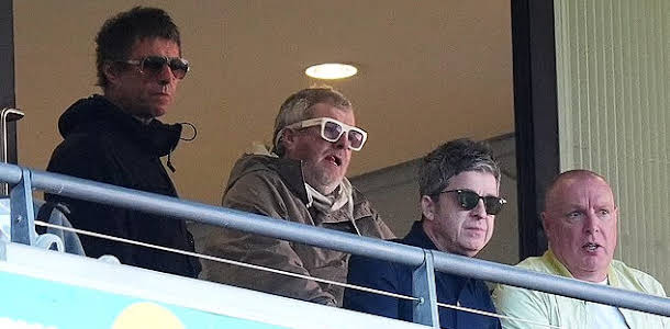 Gallagher Brothers Paul and Liam Attend Manchester City Match Together