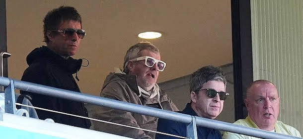 Gallagher Brothers Paul and Liam Attend Manchester City Match Together