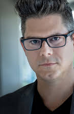 Brett Donowho som Director