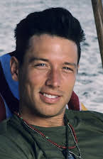 Brian Wimmer as Tom Newfield