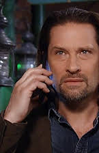 Roger Howarth as 