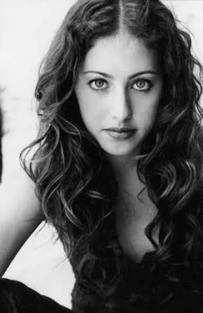 Naomi Aborn as 