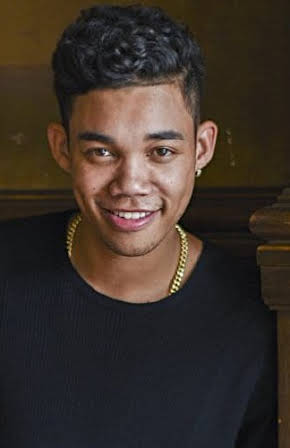 Roshon Fegan as 