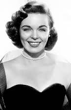 Nancy Gates como Lily, Lady Gay Saloon Owner