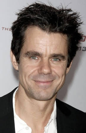 Tom Tykwer as Director
