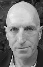 Richard Strange as Bookshop Proprietor