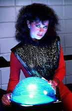 Jane Badler as 