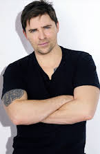 Kavan Smith as 
