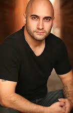 Michael Caissie as Director