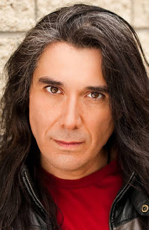 Julian Black Antelope as Lou Chester