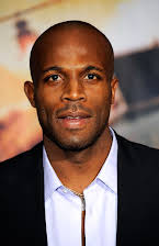 Billy Brown como 