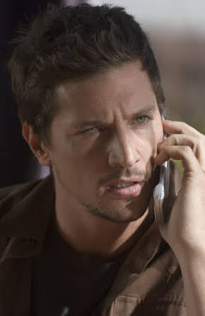 Simon Rex as 