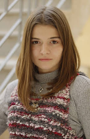 Aysha Shahaltough as 