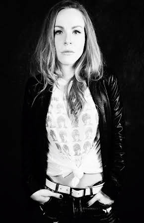 Emma Myles as 